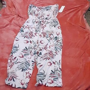 Pink floral romper by Almost Famous size large